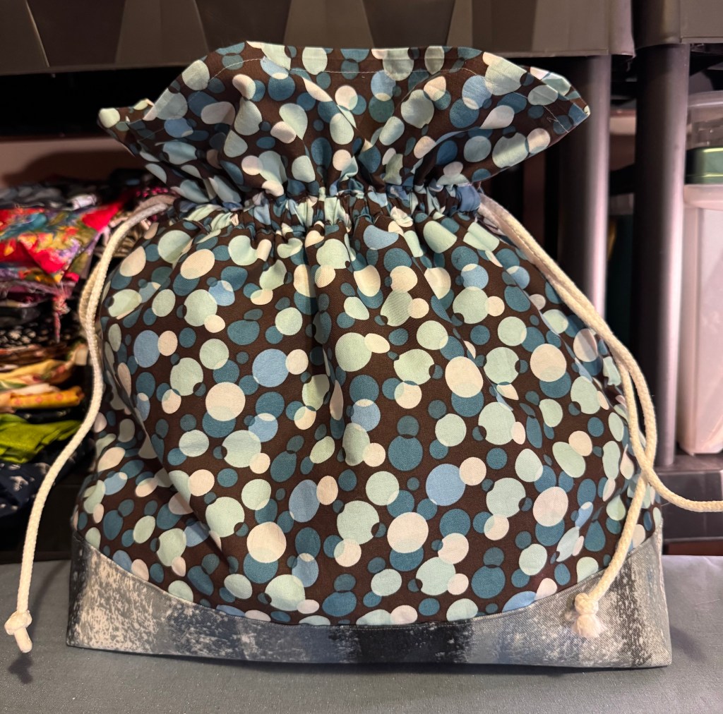 fabric drawstring bag in blue hues
